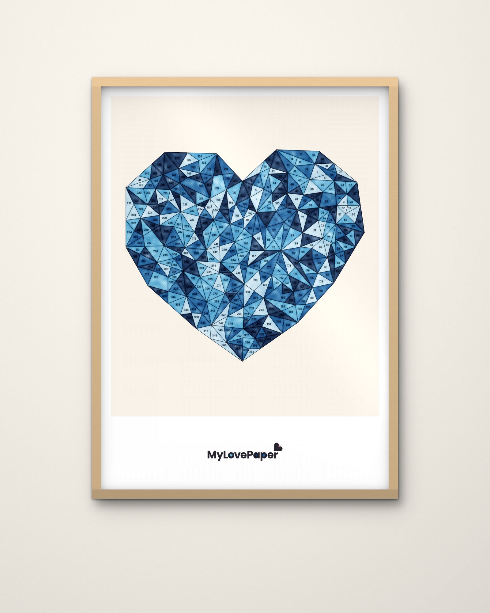 MyLovePaper Herz ausgemalt in Blautönen – gerahmt an der Wand
