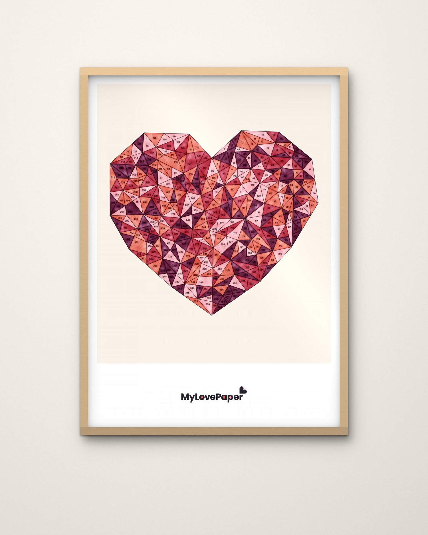 MyLovePaper Herz ausgemalt in Rottönen – gerahmt an der Wand
