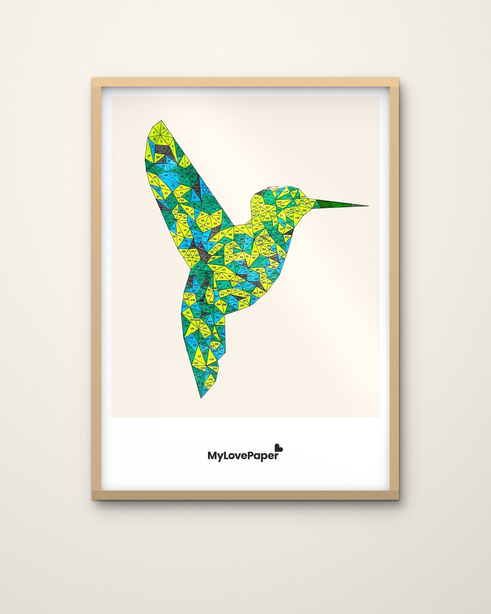 MyLovePaper Vogel ausgemalt – gerahmt an heller Wand